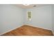 Bedroom with hardwood floors, natural light, and neutral paint at 1508 Walker Ridge Sw Dr, Marietta, GA 30064