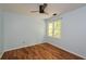 Bedroom with hardwood floors, ceiling fan, and a window at 1508 Walker Ridge Sw Dr, Marietta, GA 30064