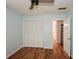 Bedroom with closet, ceiling fan, and wood floors at 1508 Walker Ridge Sw Dr, Marietta, GA 30064