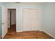 Bright bedroom with hardwood floors and a closet offers a peaceful retreat at 1508 Walker Ridge Sw Dr, Marietta, GA 30064