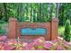 Welcoming entrance sign for Walker's Ridge, set amidst lush landscaping, creating a warm and inviting community feel at 1508 Walker Ridge Sw Dr, Marietta, GA 30064