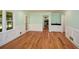 Hardwood dining room featuring wainscoting and access to kitchen at 1508 Walker Ridge Sw Dr, Marietta, GA 30064