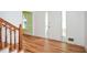 Bright foyer with hardwood floors, staircase, and natural light at 1508 Walker Ridge Sw Dr, Marietta, GA 30064