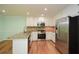 Modern kitchen with stainless steel appliances, granite counters, and white cabinets at 1508 Walker Ridge Sw Dr, Marietta, GA 30064