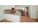 Updated kitchen with stainless appliances, granite counters, and a breakfast bar at 1508 Walker Ridge Sw Dr, Marietta, GA 30064