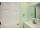 Bright, clean powder room featuring a white vanity and modern fixtures at 1508 Walker Ridge Sw Dr, Marietta, GA 30064