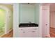 Charming wet bar features granite countertops and a copper sink basin at 1508 Walker Ridge Sw Dr, Marietta, GA 30064