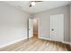 A modern bedroom featuring plank flooring, white doors and fresh, neutral paint at 1701 Aircraft S Dr, Marietta, GA 30060
