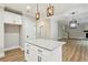 Kitchen island with granite countertop in an open floorplan home at 1701 Aircraft S Dr, Marietta, GA 30060