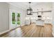 Bright kitchen featuring white cabinets, stainless appliances, and backyard view at 1701 Aircraft S Dr, Marietta, GA 30060
