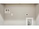 The laundry room is ready to be set up with hookups for a washer and dryer at 1701 Aircraft S Dr, Marietta, GA 30060