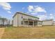 Large backyard with a covered patio, ideal for outdoor entertaining at 321 Arwen Dr, Mcdonough, GA 30252