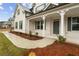 Close up of the front porch and yard details at 321 Arwen Dr, Mcdonough, GA 30252