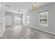 Light-filled living area with neutral paint, and an open floor plan at 6099 Camden Forrest Cv, Riverdale, GA 30296