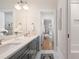 Elegant bathroom with double vanity, white countertops, and neutral decor at 132 Mount Vernon Dr, Decatur, GA 30030