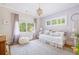 Cozy bedroom with ample natural light, daybed, and hardwood flooring at 132 Mount Vernon Dr, Decatur, GA 30030