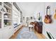 Charming hallway featuring built-in bookshelves, a window seat, and beautiful natural light at 132 Mount Vernon Dr, Decatur, GA 30030