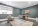 Serene home office with a wooden desk, comfortable chair, and natural light perfect for productivity and focus at 132 Mount Vernon Dr, Decatur, GA 30030