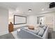 Comfortable home theater setup with large screen, sectional sofa, and ambient lighting for movie nights at 132 Mount Vernon Dr, Decatur, GA 30030