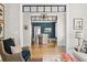 Open-concept living and dining area with hardwood floors and elegant decor throughout at 132 Mount Vernon Dr, Decatur, GA 30030