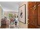 Inviting living room showcases decor, hardwood floors, and natural light streaming through the balcony doors at 28305 Plantation Ne Dr, Atlanta, GA 30324