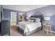 Serene bedroom featuring plush carpeting, and a king size bed at 28305 Plantation Ne Dr, Atlanta, GA 30324