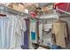 Walk-in closet with metal shelving, clothes and storage items at 28305 Plantation Ne Dr, Atlanta, GA 30324