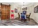 Basement dining area with sports decor, adjacent to barn door entrance at 31 Brownson Ct, Acworth, GA 30101