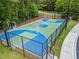 Fully fenced basketball court offers residents a dedicated space for sports and recreation at 31 Brownson Ct, Acworth, GA 30101