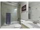 Bathroom with a tub/shower combo, neutral tile and a single sink vanity at 31 Brownson Ct, Acworth, GA 30101