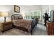 Cozy bedroom with carpet floors, large window, and decorative bear at 31 Brownson Ct, Acworth, GA 30101