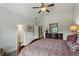 Bedroom with hardwood floors and two open doors leading to closet and bathroom at 31 Brownson Ct, Acworth, GA 30101