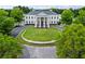 The impressive clubhouse, framed by mature trees and manicured grounds, offers a welcoming community presence at 31 Brownson Ct, Acworth, GA 30101