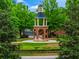 Picturesque gazebo surrounded by manicured lawns and mature trees creates a tranquil community focal point at 31 Brownson Ct, Acworth, GA 30101