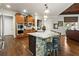 Spacious kitchen features a stone-clad island with breakfast bar seating at 31 Brownson Ct, Acworth, GA 30101
