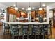 Gourmet kitchen with stone island, stainless steel appliances, and hardwood floors at 31 Brownson Ct, Acworth, GA 30101