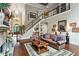 Open-concept living room boasts hardwood floors and a staircase to the upper level at 31 Brownson Ct, Acworth, GA 30101