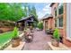 Outdoor patio featuring an outdoor kitchen, seating, and landscaping at 31 Brownson Ct, Acworth, GA 30101