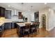 Well-equipped kitchen features dark cabinets, an island with seating, and a walk-in pantry at 3909 Obryant Se Cir, Smyrna, GA 30082