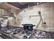Modern kitchen showcasing stainless steel gas cooktop and decorative tile backsplash at 5118 Greythorne Ln, Marietta, GA 30068