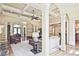 Open-concept living space with coffered ceilings, hardwood floors, and elegant archways at 5118 Greythorne Ln, Marietta, GA 30068