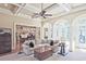 Expansive living room with coffered ceiling, large windows, and open floor plan at 5118 Greythorne Ln, Marietta, GA 30068