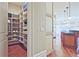 Walk-in pantry with custom shelving for ample storage in this modern home at 5118 Greythorne Ln, Marietta, GA 30068