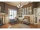 Beautifully decorated study with a fireplace, built-ins, and a cozy workspace at 5118 Greythorne Ln, Marietta, GA 30068