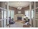 Cozy study with fireplace, custom built-ins, and abundant natural light at 5118 Greythorne Ln, Marietta, GA 30068