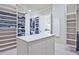 Spacious walk-in closet with custom shelving and ample storage space for clothes and accessories at 5118 Greythorne Ln, Marietta, GA 30068