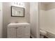 Updated bathroom features a modern vanity, framed mirror, and a shower-tub combination at 6255 Saddlewood Dr, Lithonia, GA 30058