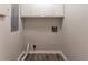 Functional laundry room with essential hookups and clean, minimalist design at 6255 Saddlewood Dr, Lithonia, GA 30058