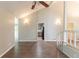 Spacious living room featuring hardwood floors and an open layout at 6255 Saddlewood Dr, Lithonia, GA 30058