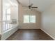 Cozy loft area with hardwood floors, vaulted ceilings, and ample natural light at 6255 Saddlewood Dr, Lithonia, GA 30058